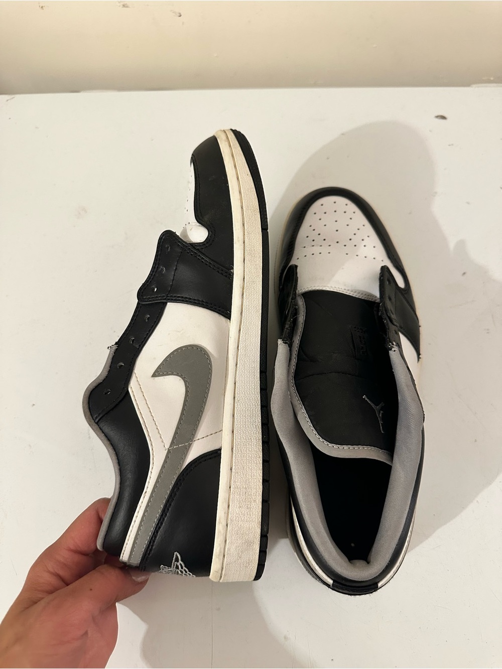Jordan Black, White, and Gray Low-Top Sneakers
